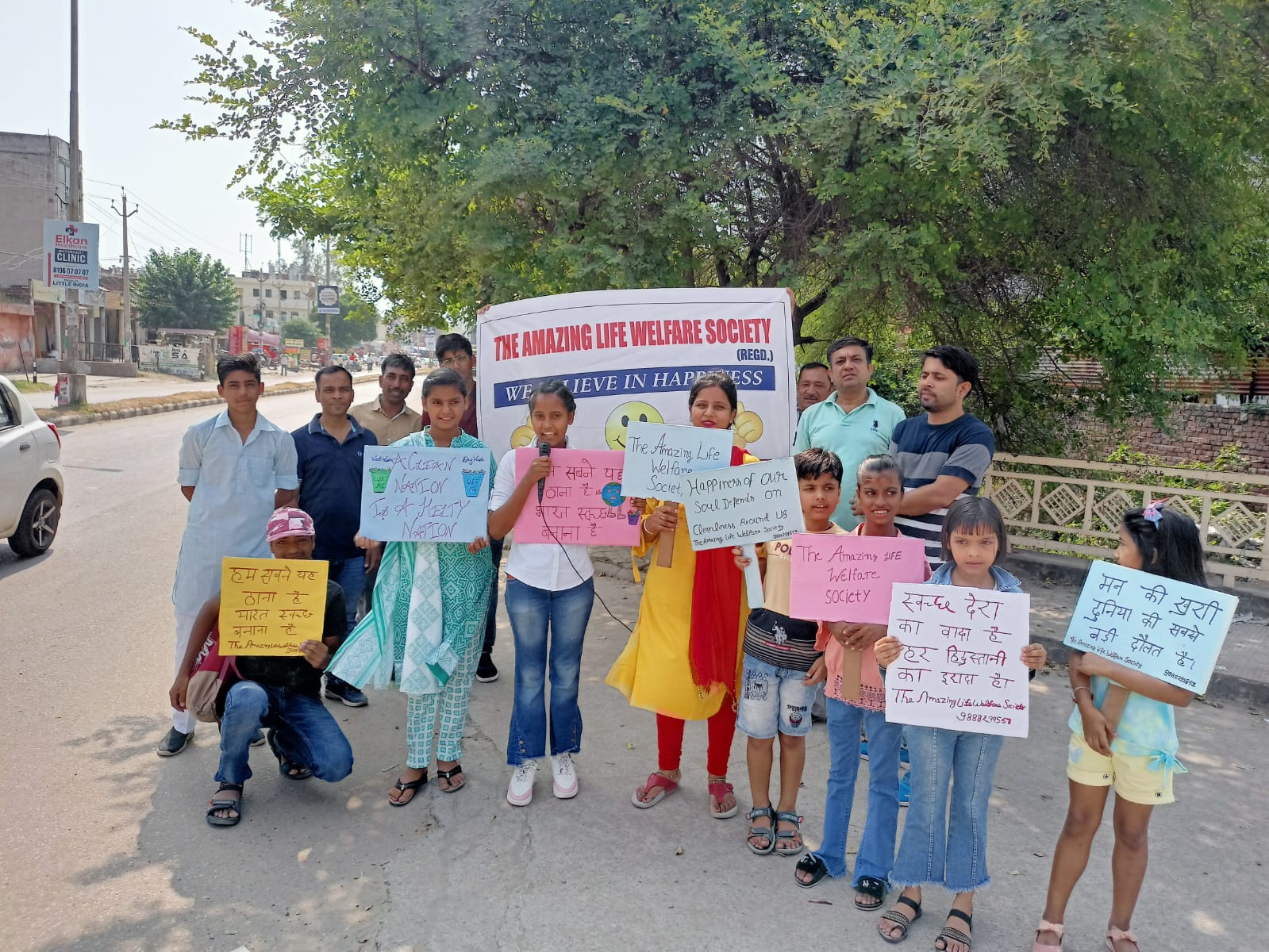 Volunteers on a street cleanliness awareness walk