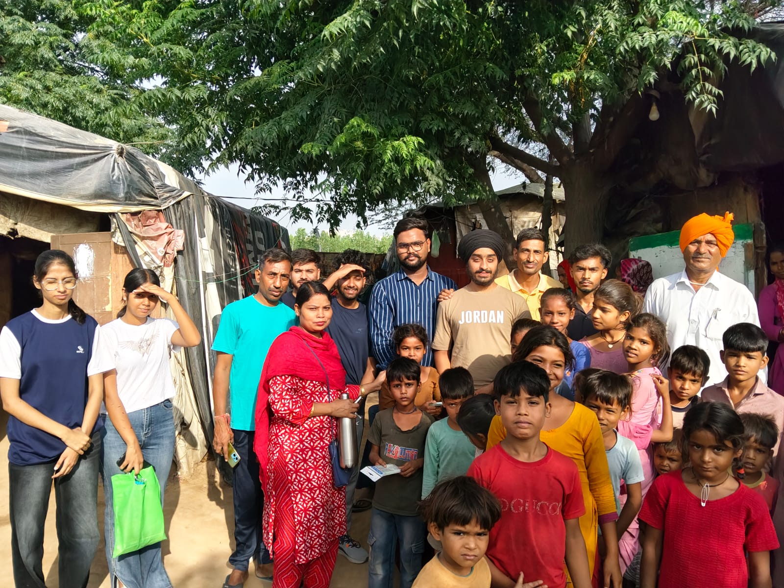 Volunteers and children of The Amazing Life Welfare Society
